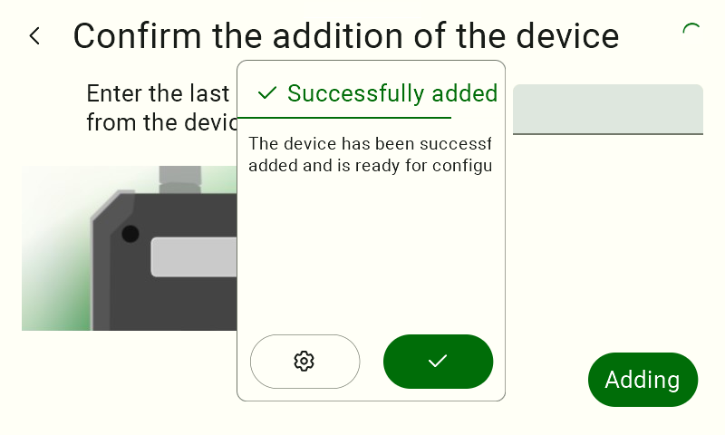 Pop-up window displaying the success message "Added successfully". This screen informs the user that the sensor has been properly authenticated, paired with the system, and is ready for further configuration. To close the information window, click the green circular button with the checkmark symbol (✓).