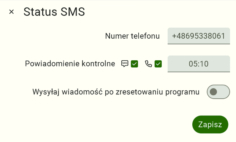 Ekran konfiguracyjny o nazwie "Status SMS". Znajdują się tu dwa jasnoszare pola do uzupełnienia: "Numer telefonu", w które należy kliknąć, aby wpisać docelowy numer odbiorcy raportu, oraz "Czas wysyłania wiadomości", służące do ustalenia godziny codziennego powiadomienia. Po prawidłowym wprowadzeniu obu parametrów, użytkownik musi zatwierdzić konfigurację, klikając ciemnozielony przycisk "Zapisz" znajdujący się w prawym dolnym rogu ekranu.