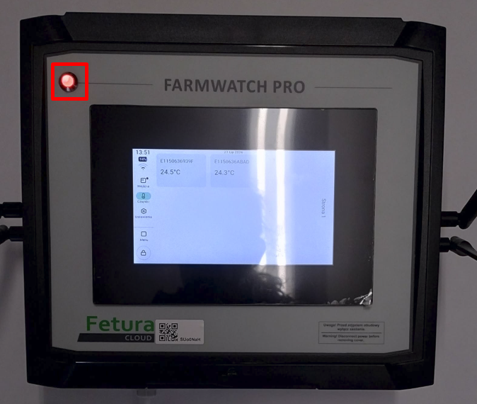 Widok przedstawiający urządzenie FarmWatch Pro z diodą świecącą na czerwono.