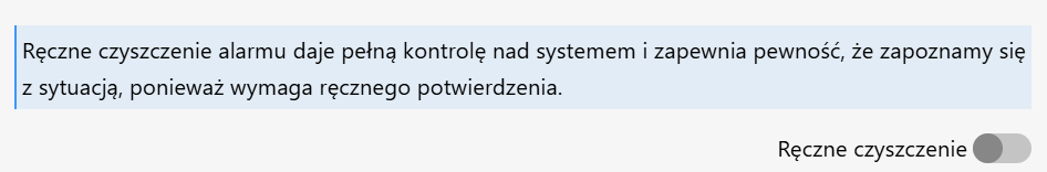 Na zdjęciu widać w panelu konfiguracji alarmu sekcję "Typ czyszczenia alarmu" z zaznaczoną opcją "Ręczne czyszczenie".
